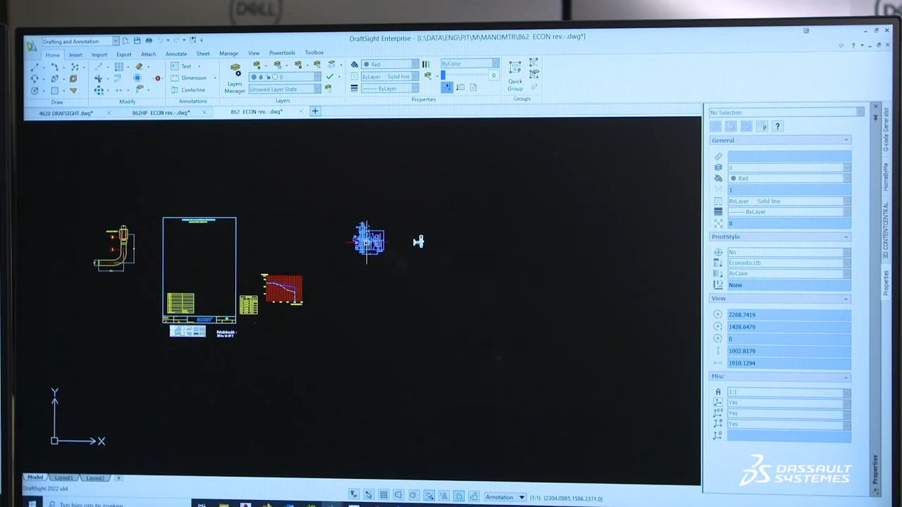 a computer with DraftSight software on the screen